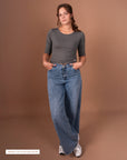 Gray 3/4 sleeve activewear top from Theia Moon, modern and comfortable