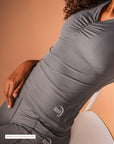 Neckline detail on the gray tank top by Theia Moon