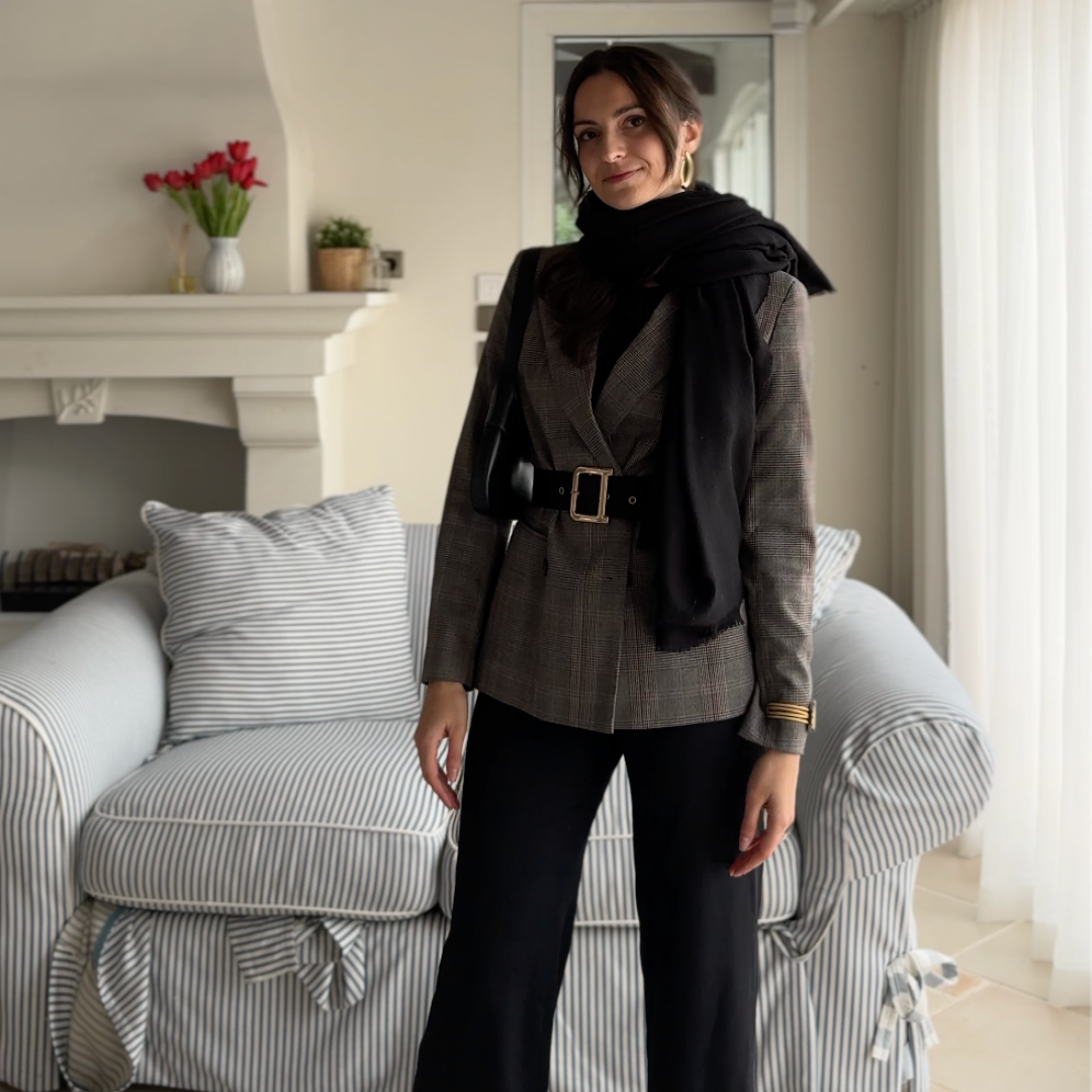 Black high-waist wide-leg pants and a 3/4 sleeve top offering comfort, elegance and freedom of movement throughout the day