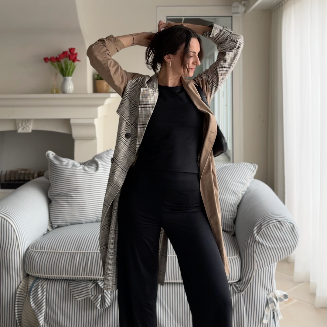 Black high-waist wide-leg pants and 3/4 sleeve top styled for everyday wear, combining activewear comfort with a work-ready silhouette