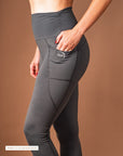 Pocket detail on the gray Theia Moon leggings