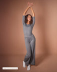Gray high-waist wide-leg pants from Theia Moon, flowy and elegant