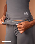 Waistband detail of Theia Moon gray wide-leg pants